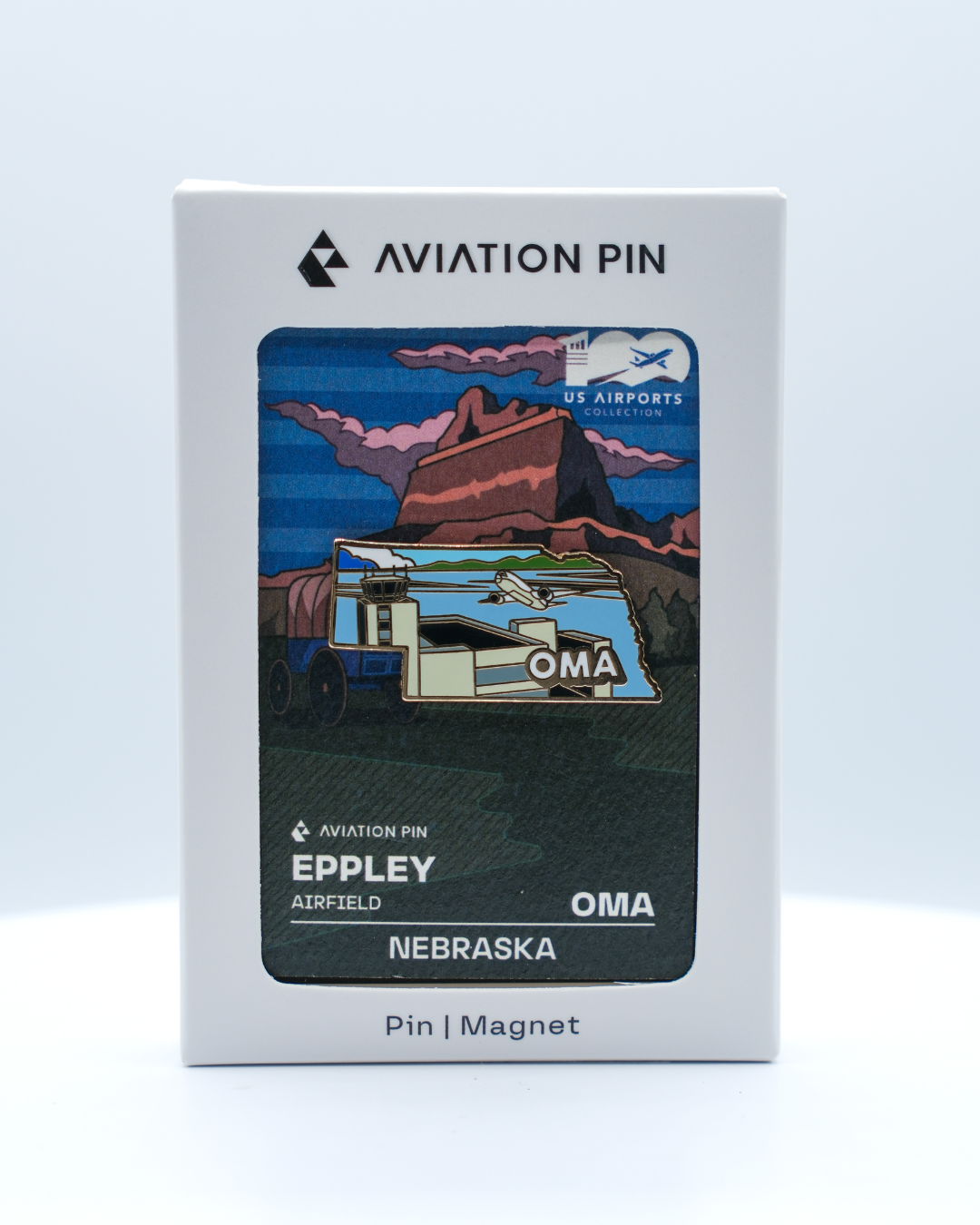 OMA airport pin for Eppley Airfield, in its white display box with an illustrated backing card.